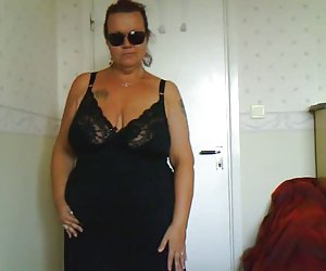 Female stripping in bedroom