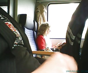 Train masturbation in front of older lady