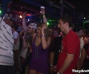 Hot girl doing a striptease in public