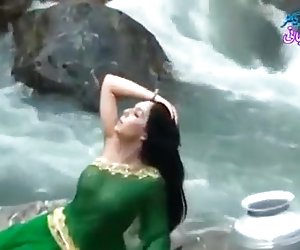 Desi girl in transparent wet saree showing boobs..hot show