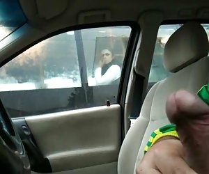 Flashing in car through the bus window