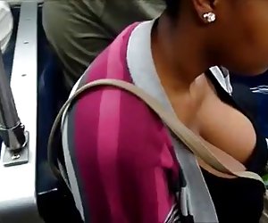 Jiggling Black Tits in Train