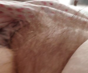 rubbing her thick soft hairy pussy