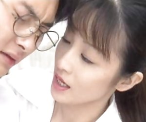 Cute Japanese student getting jacked-off by sexy teacher