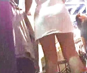 Upskirt - girl in a shopping center