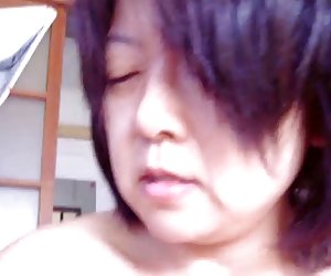 Japanese milf Jerking