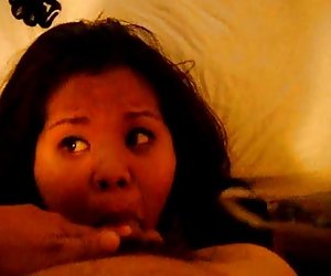 Asian slut sucks and receives cum on her face