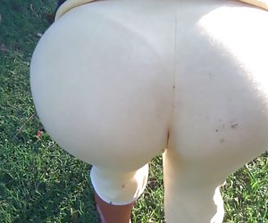 Latin Teen in Tight Yellow Pants showing ass and cameltoe