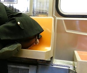 Candid upskirt booty on train of NYC