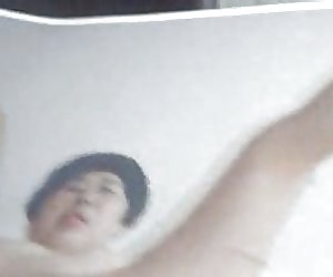 Man Masturbating over Photo of Mrs Pat Wong