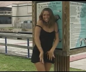 sexy brunette exhibitionist strips and flashes in public