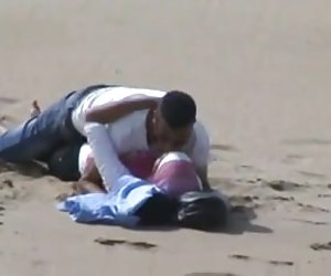 arab hijab girl with her bf caught having sex on the beach