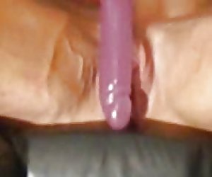 Muscle Goddess Maryse Manios plays with a dildo