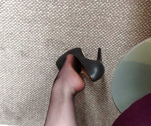 Louise Nylon dangling her high heels before afternoon fun