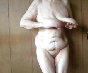 Brunette takes off her clothes and massage and finger her pussy.